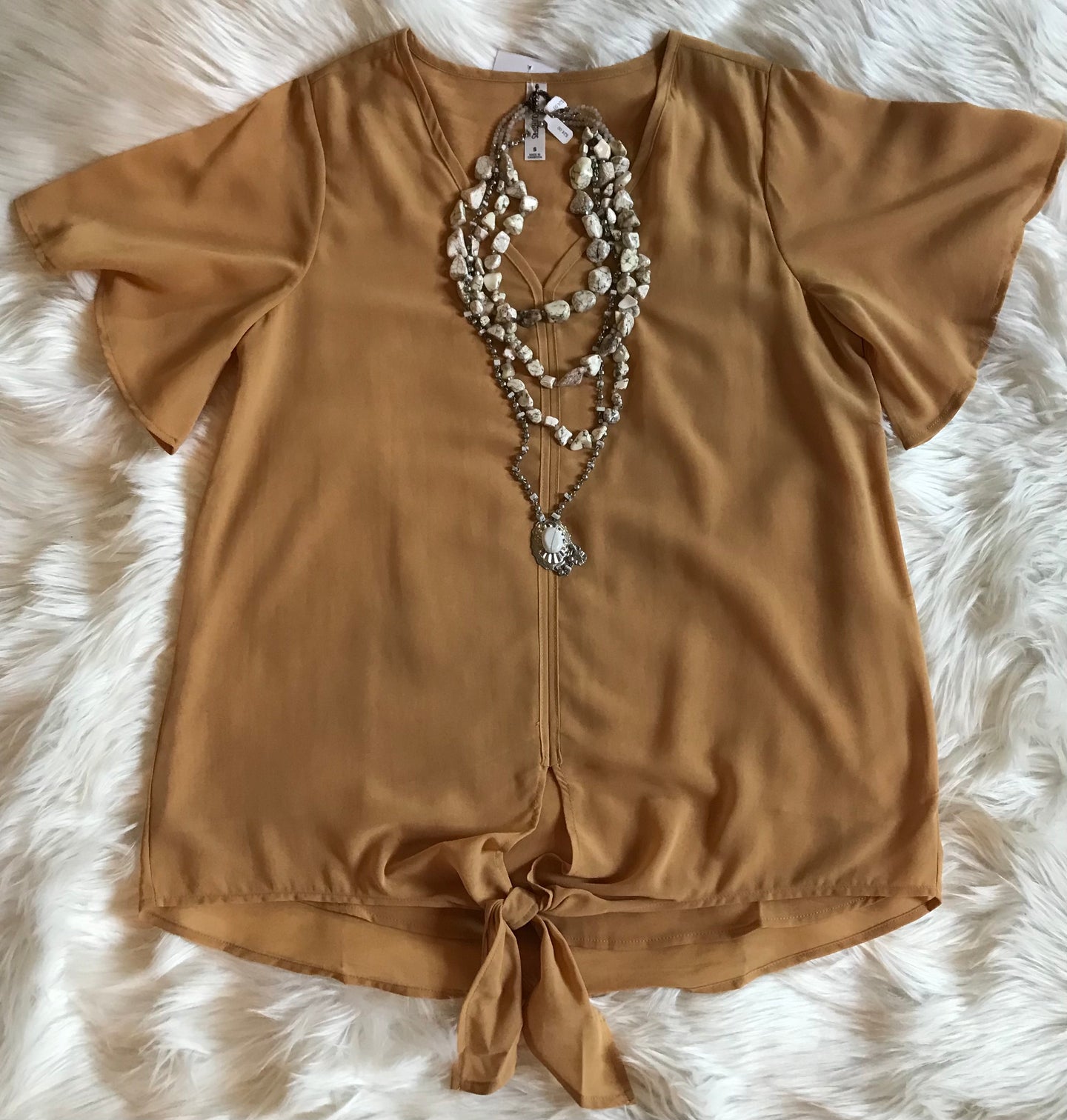 Blouse with tie-knot